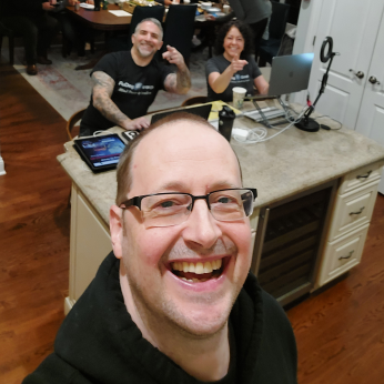 Aaron Hoos with business partners
