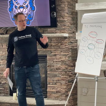 Aaron Hoos sharing business insights